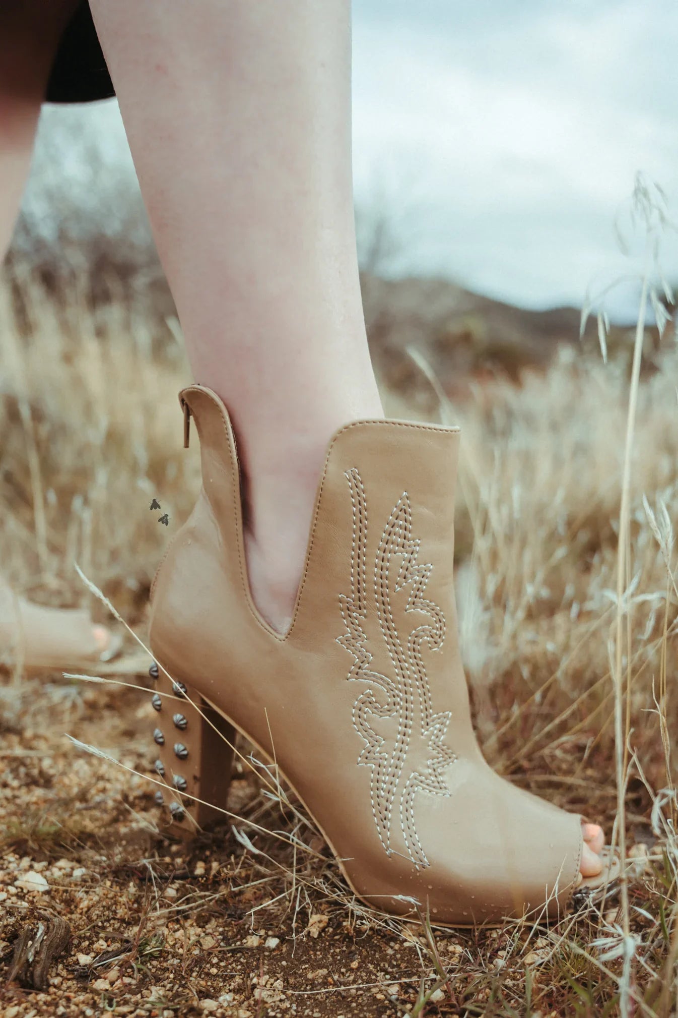 HIGH DEMAND RIVER ROCK HEELS